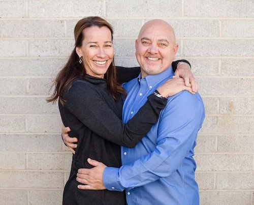Headshot of owner and his wife